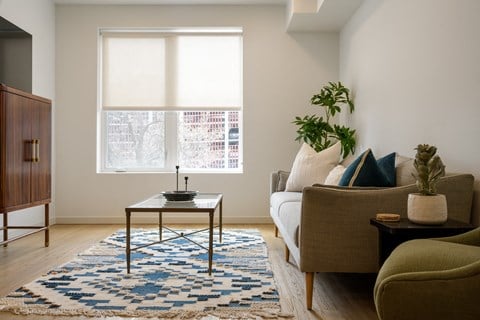 a living room with a couch and a coffee table